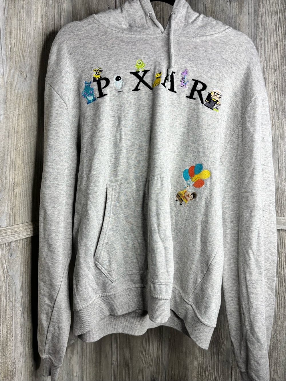 Disney Gray Crewneck Sweatshirt with Colorful Character Graphics